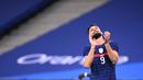 Ekspresi striker Prancis, Olivier Giroud, saat melawan Finlandia pada laga uji coba di Stadion Stade de France, Rabu (11/11/2020). Prancis takluk dengan skor 0-2. (AFP/Franck Fife)