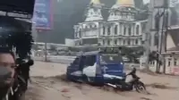 Banjir bandang yang melanda Parapat diduga terjadi akibat intensitas hujan yang tinggi