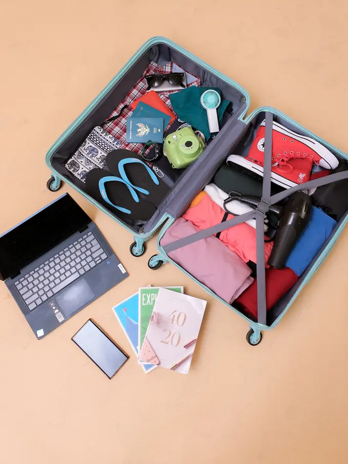 Cara Menata Isi Koper agar Tak Berantakan