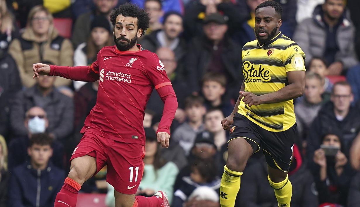 Dua menit berselang giliran Mohamed Salah yang menyumbang gol bagi Liverpool usai menerima umpan dari Roberto Firmino untuk kembali menjauh dari Watford dengan margin 4 gol. (PA via AP/Tess Derry)