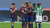 Pertandingan Barcelona melawan Real Betis pada lanjutan Liga Spanyol di Camp Nou, Sabtu (7/11/2020). (AFP/Josep Lago)