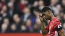 Striker Manchester United, Marcus Rashford, tampak kecewa usai pertandingan.  Dari 18 tembakan, Marcus Rashford dan kawan-kawan hanya mampu melepaskan tiga tembakan tepat ke gawang. (AFP/Oli Scarff)