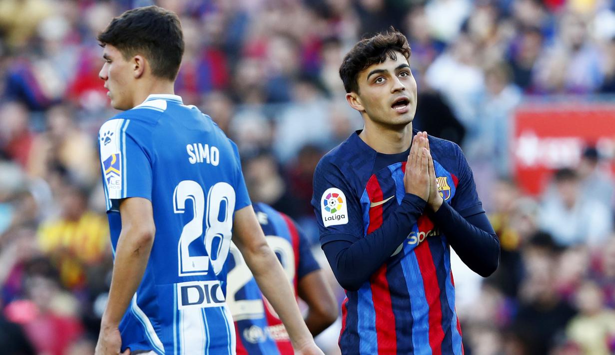 Raihan satu poin ini masih menempatkan Barcelona di puncak klasemen sementara dengan 38 poin, tetapi jumlah poinnya sama dengan Real Madrid di posisi dua. Espanyol sendiri masih tertahan di peringkat ke-16 dengan 13 poin. (AP Photo/Joan Monfort)