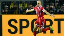 Arjen Robben melakukan selebrasi usai mencetak gol ke gawang Borussia Dortmund pada pertandingan Bundesliga Jerman di Dortmund, (4/11). Munchen memuncaki klasemen dengan 26 poin, unggul empat poin dari RB Leipzig. (AP Photo / Martin Meissner)