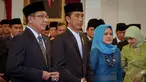 Presiden Jokowi (tengah) didampingi Ibu Negara, Iriana Jokowi (kanan) dan Menag Lukman Hakim menghadiri acara Peringatan Isra Miraj Nabi Muhammad SAW Tahun 1436 H/2015 M di Istana Negara, Jakarta, Jumat (15/5) malam. (Liputan6.com/Faizal Fanani)