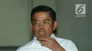 Menteri Sosial Idrus Marham berjalan usai menjalani pemeriksaan oleh penyidik di gedung KPK, Jakarta, Kamis (26/7). Idrus diperiksa terkait kasus menerima suap Rp 4,8 miliar proyek PLTU Riau-1. (Merdeka.com/Dwi Narwoko)