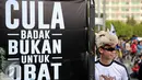 Dunia Aktivis saat mensosialisasikan hari Badak Dunia di Jakarta, Minggu (27/9/201). Kampanye dilakukan untuk penyadartahuan dan penyelematan Badak Sumatera dan Badak Jawa yang populasinya tiap tahun makin berkurang. (Liputan6.com/Faizal Fanani)