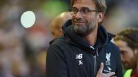 Ekspresi pelatih Liverpool, Jurgen Klopp, setelah membawa timnya mengalahkan Everton pada laga bertajuk Merseyside derby, Rabu (20/4/2016). (EPA/Peter Powell)
