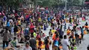 H+3 Hari Raya Idul Fitri 1435 H, ribuan wisatawan memadati Pantai Ancol, Jakarta, (30/7/2014). (Liputan6.com/Faizal Fanani)