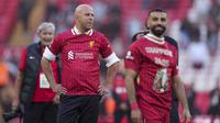Pelatih Liverpool, Arne Slot setelah memastikan timnya juara Liga Inggris 2024/2025 setelah mengalahkan Tottenham Hotspur di Anfield, Liverpool, Inggris, Minggu (27/04/2025). (AP Photo/Jon Super)