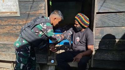 Satgas Pamtas Yonif 511/DY Tingkatkan Layanan Kesehatan Gratis Tolikara