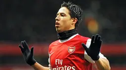 Raut gembira Samir Nasri yang mencetak dua gol untuk kemenangan Arsenal yang mengalahkan Fulham 2-1 di Emirates Stadium, London, pada 4 Desember 2010. AFP PHOTO/BEN STANSALL