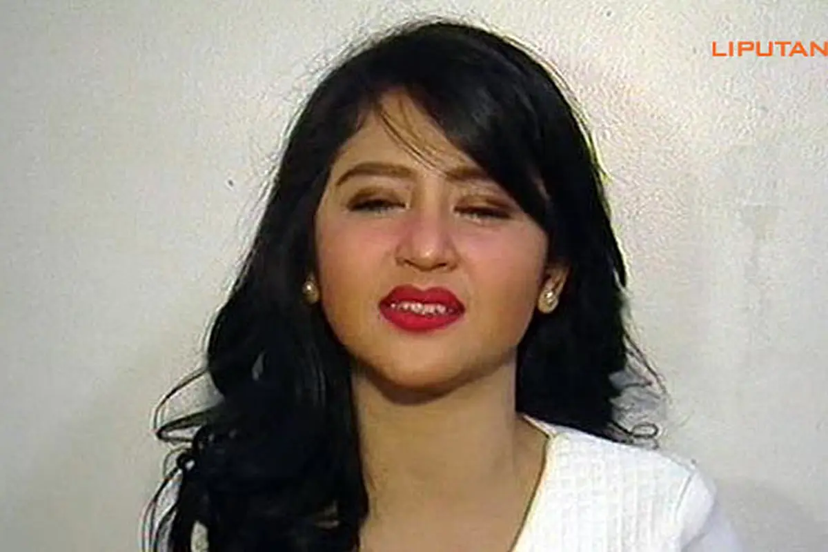 dewi-perssik-2-140206b.jpg