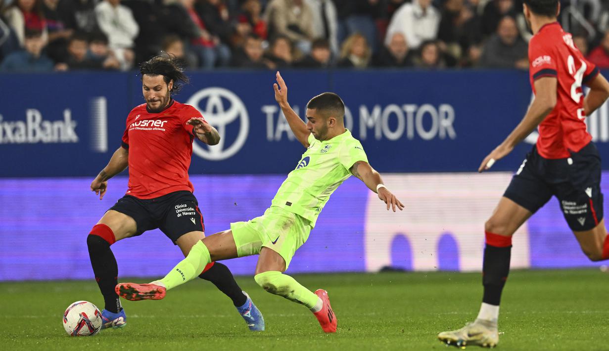 Hasil ini jadi kekalahan pertama Barcelona di liga sekaligus kekalahan pertama Hansi Flick di liga. Barcelona masih di puncak klasemen sementara dengan 21 poin. (AP Photo/Miguel Oses)