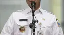 Gubernur DKI Jakarta Anies Baswedan memberikan keterangan seusai menjalani pemeriksaan di Gedung KPK, Jakarta, Rabu (7/9/2022).