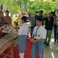 SMAN 11 Kota Kupang luncurkan program makan siang gratis bagi siswa. (Foto: Liputan6.com/Ola Keda)