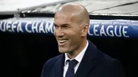 Zinedine Zidane kembangkan senyum usai Real Madrid menang lawan Wolfsburg (Sergio Perez/Reuters)