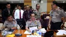 Kapolri Jenderal Tito Karnavian bersama para stafnya seusai mengikuti rapat dengan Komisi III di Gedung Parlemen Senayan, Jakarta, Senin (5/12). (Liputan6.com/Johan Tallo)