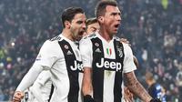 Striker Juventus Mario Mandzukic mreayakan golnya ke gawang Inter Milan dalam lanjutan Liga Italia di Allianz Stadium, Sabtu (8/12/2018) dini hari WIB. Juventus menang 1-0. (Andrea Di Marco/ANSA via AP)