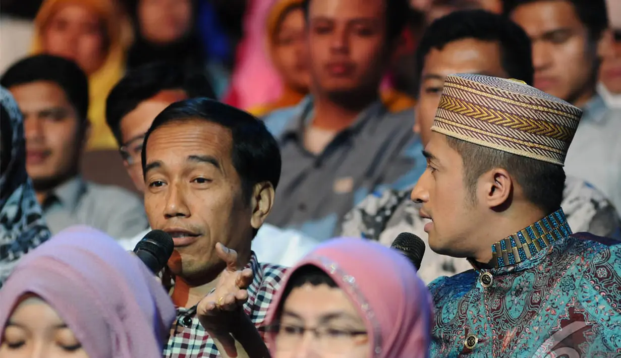  Jokowi memberikan komentarnya terkait ajang pencarian bakat di perhelatan Malam Puncak Putri Muslimah Indonesia 2014 di TMII, Jakarta, Rabu (28/5/2014) (Liputan 6.com/Andrian M Tunay)