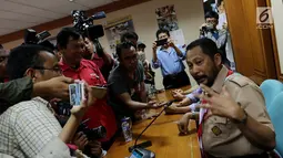 Ketua Kwarnas Pramuka Budi Waseso memberi keterangan pers di Jakarta, Selasa (16/10). Dalam keterangannya Budi Waseso menanggapi Video Kampanye Pilpres 2019 Pakai Atribut Pramuka yang sempat viral adalah bukan anggota Pramuka. (Liputan6.com/Johan Tallo)