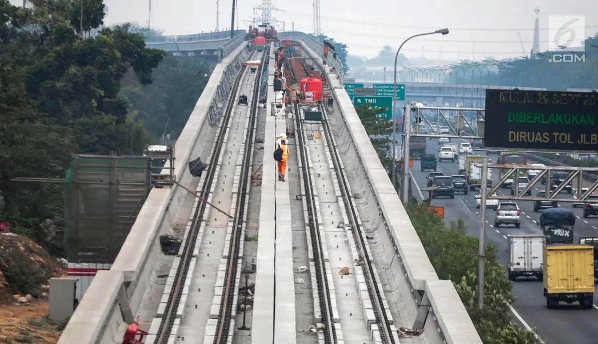 FOTO: Sudah Dipasangi Rel, Begini Penampakan Jalur LRT Rute Cibubur ...