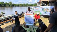 Desa Parupuk, Kecamatan Katingan, Kalimantan Tengah, saat menerima kurban dari Baitul Maal Hidayatullah (BMH), Sabtu (8/6/2025). (istimewa)