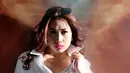 Tampil dengan mengenakan kemeja polos yang dipadu dengan jeans membuat Melinda terlihat semakin seksi, Jakarta, Senin (23/11/2015). (Liputan6.com/Gempur M Surya) 