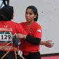 Rajiah Salsabillah (kanan) menjadi salah satu atlet panjat tebing putri Indonesia yang merebut emas Asian Games 2018 pada nomor speed relay ( ANTARA FOTO/INASGOC/Hendra Nurdiyansyah/nym/18)