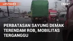 Perbatasan Sayung Demak, arah Demak ke Semarang, terendam rob cukup tinggi. Peristiwa banjir terpantau pada Jumat (22/11/2024)