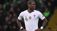 Namun Pogba masih belum pernah merasakan bagaimana menjadi sorang juara Liga Champions.  Meraih gelar Liga Champions dibawah nahkoda Zidane dirasa akan lebih mudah didpatkan Pogba jika dibandingkan meriahnya bersama Man United. (AFP/Franck Fife)