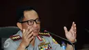 Kapolri Jenderal Tito Karnavian menjawab pertanyaan terkait penetapan Basuki Tjahaja Purnama (Ahok) sebagai tersangka kasus penistaan agama di Jakarta, Rabu (16/11). Ahok ditetapkan tersangka usai gelar perkara, (15/11). (Liputan6.com/Helmi Fithriansyah) 