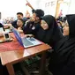 Program "Aksi Internet Pusaka Dunia" yang diselenggarakan Hutchison Tri Indonesia. Foto: Tri