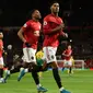 Penyerang Manchester United, Marcus Rashford, berhasil mencetak dua gol sekaligus membantu timnya menang 4-0 atas Norwich City pada laga pekan ke-22 Premier League, di Old Trafford, Sabtu (11/1/2020). (AFP/Oli Scarff)