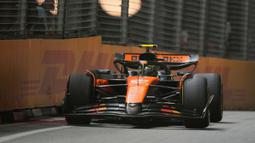 McLaren memastikan diri mereka menyabet gelar ini dengan koleksi 650 poin disusul oleh Mercedes dengan raihan 325 poin. (AP Photo/Vincent Thian)