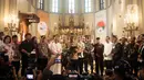 Penjabat (Pj) Gubernur DKI Jakarta, Heru Budi Hartono (tengah) menyampaikan sambutan saat melakukan kunjungan di Gereja Katedral, Jakarta, Sabtu (24/12/2022). Heru Budi bersama Forkopimda melakukan peninjauan ke gereja-gereja untuk memberi pesan damai dan toleransi di DKI Jakarta. (Liputan6.com/Helmi Fithriansyah)