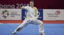 Atlet wushu Indonesia, Lindswell, saat beraksi pada Asian Games di JIExpo, Jakarta, Minggu, (19/8/2018). Sukses mengumpulkan poin tertinggi, atlet cantik ini berpeluang meraih emas dari nomor Taijiquan dan Taijijian. (Bola.com/Vitalis Yogi Trisna)