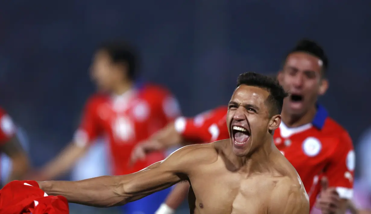 Ekspresi Alexis Sanchez setelah memastikan juara. (REUTERS/Marcos Brindicci)