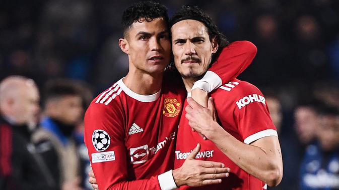 Di Grup H, dua pemain Manchester United, Cristiano Ronaldo (Portugal) dan Edinson Cavani (Uruguay) akan saling berhadapan di matchday kedua Grup H, 29 November 2022. Keduanya pun pernah bertemu di babak 16 Besar Piala Dunia 2018 lalu. (AFP/Marco Bertorello)