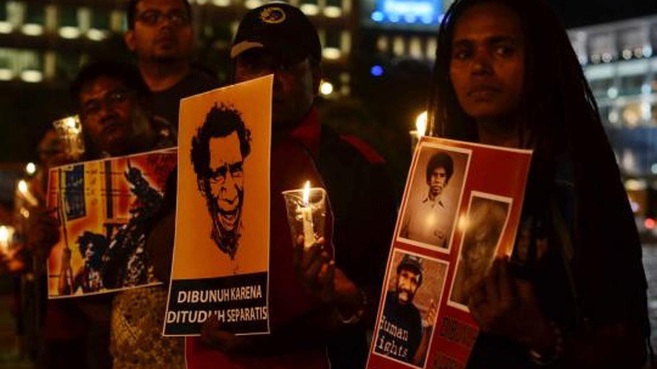 Aksi lilin solidaritas untuk Papua