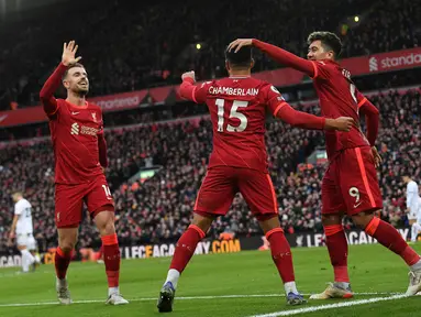 Liverpool menjadi satu-satunya klub yang tak terkalahkan di laga kandang Liga Inggris musim ini. The Reds mampu membawa 36 poin dari 14 pertandingan kandangnya. Mereka juga berpotensi untuk memangkas bahkan menyamakan poin dari sang pemuncak klasemen pada pekan-pekan terakhir ini. (AFP/Paul Ellis)