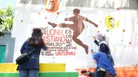 Mengintip Keseruan Warga Depok Bergotong Royong untuk Hias Kampung Bucin Piala Dunia 2022