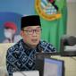 Gubernur Jabar Ridwan Kamil saat menghadiri jumpa pers via konferensi video dari Gedung Pakuan, Kota Bandung, Rabu (21/7/2021). (Foto: Pipin/Biro Adpim Jabar)