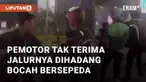Seorang driver ojol terlibat perkelahian dengan bocah pesepeda. Bocah tersebut sedang asyik membuat video di jalur khusus sepeda
