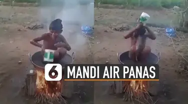 Bukannya kepanasan tapi bocah ini sangat menikmati mandi air panasnya.