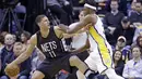 Pemain Brooklyn Nets, Brook Lopez (kiri) mencoba menerobos pertahanan pemain Indiana Pacers, Myles Turner (kanan) pada laga lanjutan NBA di  Bankers Life Fieldhouse, Indianapolis, (5/1/2017).  Pacers menang 121-109. (AP/Michael Conroy)