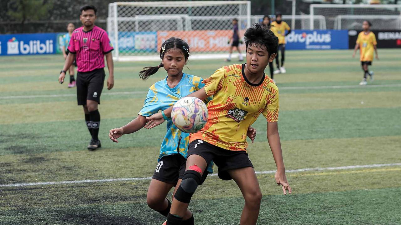 FOTO: Keseruan Murid SD Bermain Bola saat MilkLife Soccer Challenge-Jakarta 2025