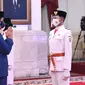 Paskibraka 2020 wakil Bengkulu Sudrajat Prawijaya sesudah dikukuhkan sebagai Pasukan Pengibar Bendera Pusaka oleh Presiden Jokowi pada Kamis, 13 Agustus 2020, di Istana Negara (Foto: Dokumentasi Istana)