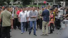 Presiden Joko Widodo tiba di Stasiun MRT Istora Mandiri, Jakarta, Minggu (24/3). Jokowi dijadwalkan bakal meresmikan beroperasinya moda raya terpadu (MRT) Jakarta fase I Lebak Bulus-Bundaran HI hari ini, Minggu, 24 Maret 2019. (Liputan6.com/Faizal Fanani)