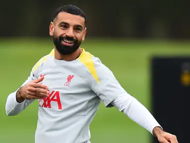 Pemain depan Liverpool, Mohamed Salah bereaksi saat berlatih di tempat latihan tim di Liverpool, barat laut Inggris, pada 16 September 2024. (Peter POWELL/AFP)